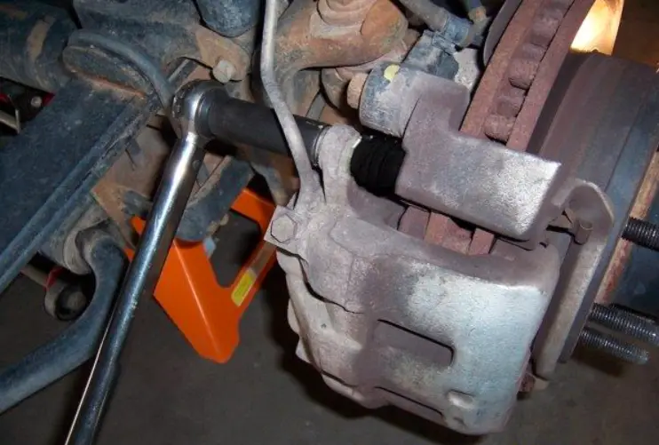 brake caliper guide pin stuck