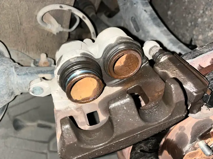 brake caliper leaking fluid from piston