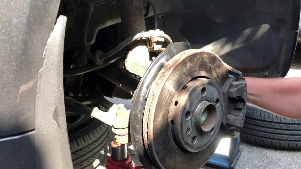 brake rotor dust shield scraping noise