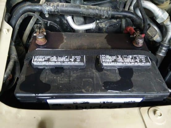 car battery leaking from top