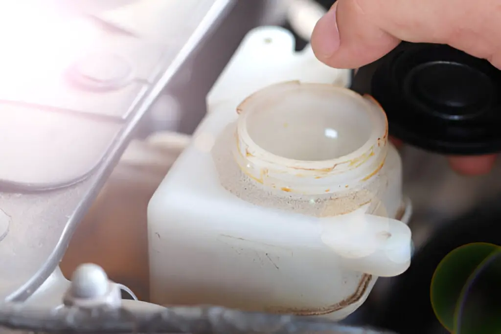 Replacing the Windshield Wiper Fluid Container