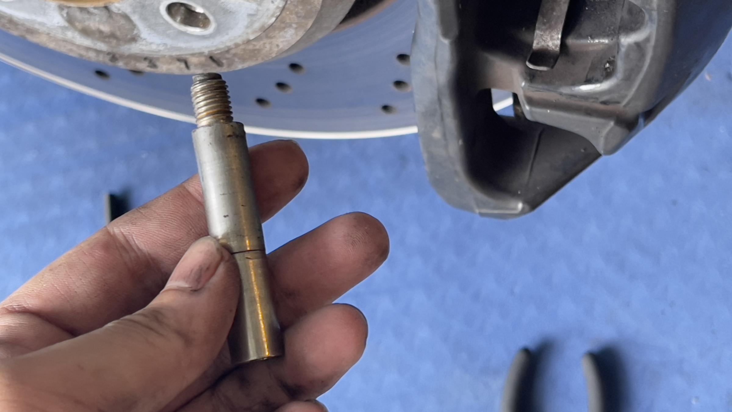 brake caliper guide pin stuck