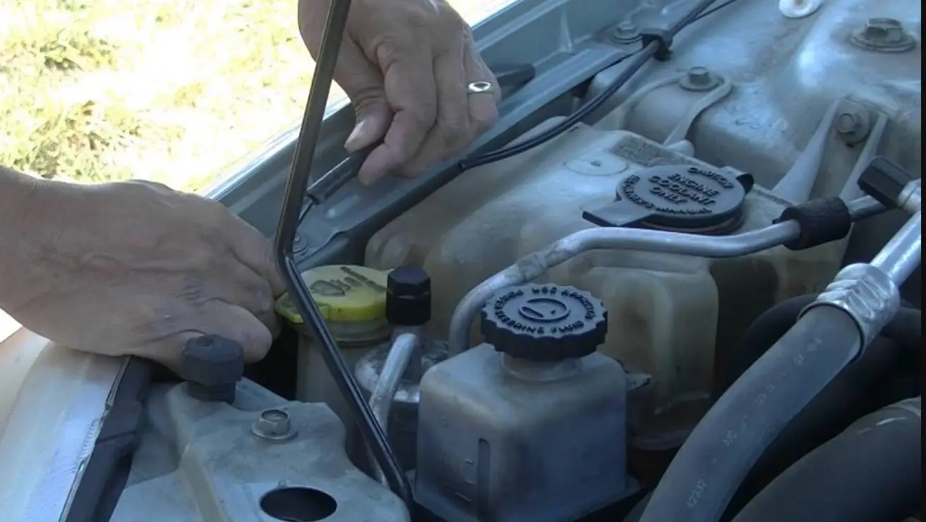 how to replace windshield wiper fluid hose