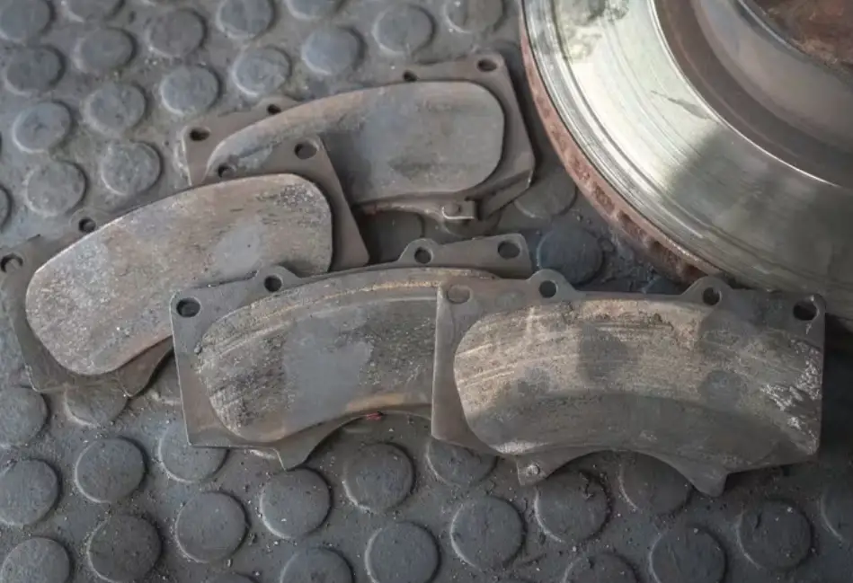 why do brake pads wear unevenly